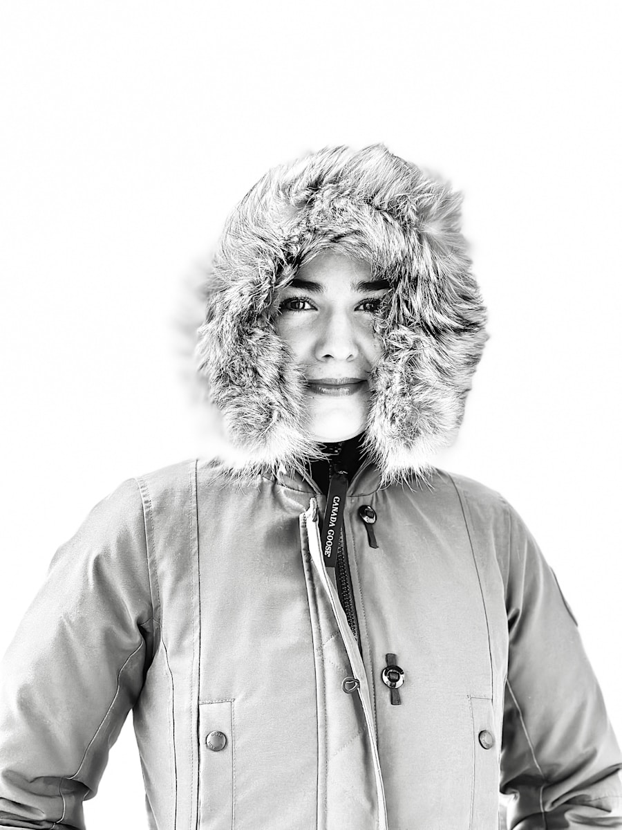 a woman wearing a fur hat and jacket